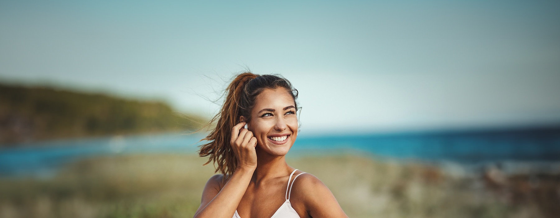 woman out for exercise at the beach