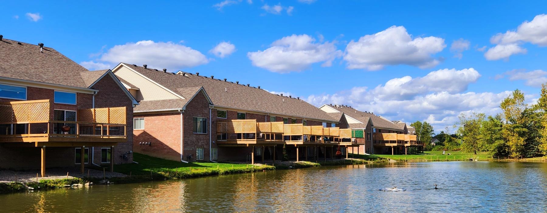 a row of houses on a river
